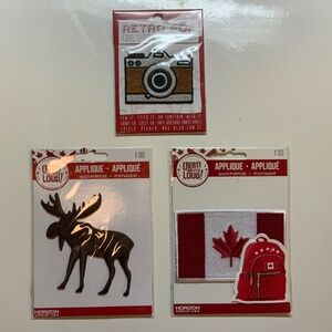 Three embroidered iron-on patches: Moose, Canada flag, camera
